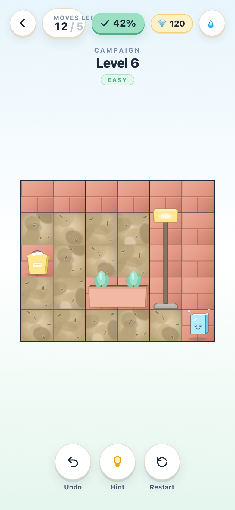 Splash Sweep on a phone — Level 6 of the campaign, a brick wall patio with a washer nozzle mid-clean.